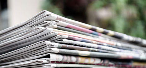 Stack of newspapers close up